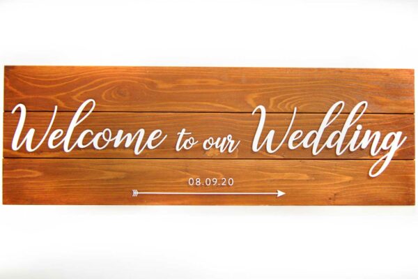 Wood pallet wedding sign with text "Welcome to our Wedding"