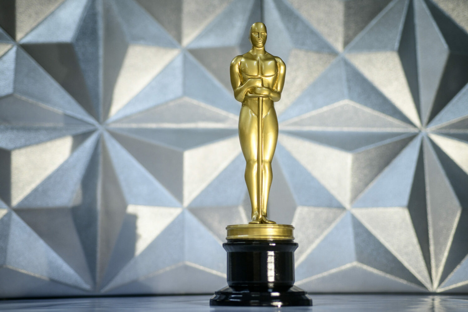 3D resin printed replica Oscar statuette with metallic silver background